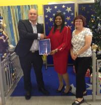 First place winner Jeema George from Tully Nursing Home, with Derek Irwin, Director of HealthX and Debbie Creagh Director of Nursing.